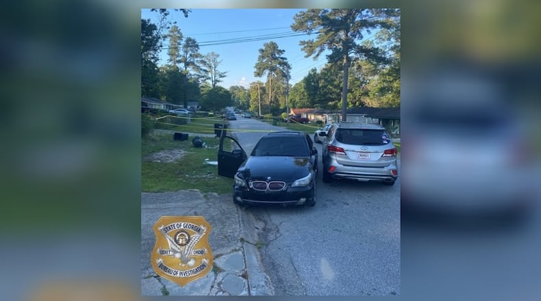 Janathaen Strum, 24, of Columbus, was shot in a black BMW sedan by a Columbus police officer investigating gunfire Sunday on Urban Avenue, according to the GBI.