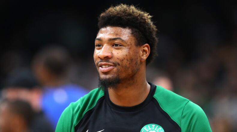 Marcus Smart of the Boston Celtics looks on before the game against the Dallas Mavericks at TD Garden on January 04, 2019 in Boston, Massachusetts.
