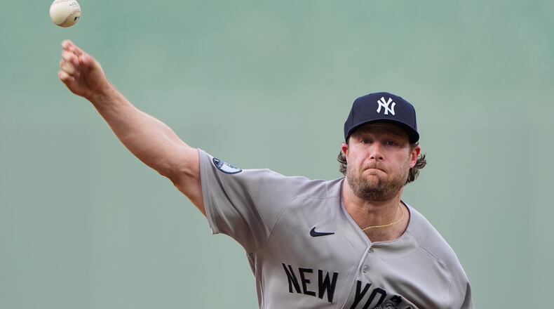 New York Yankees starting pitcher Gerrit Cole throws during the first inning of baseball game against the Kansas City Royals, Wednesday, May 27, 2026, in Kansas City, Mo. (AP Photo/Charlie Riedel)