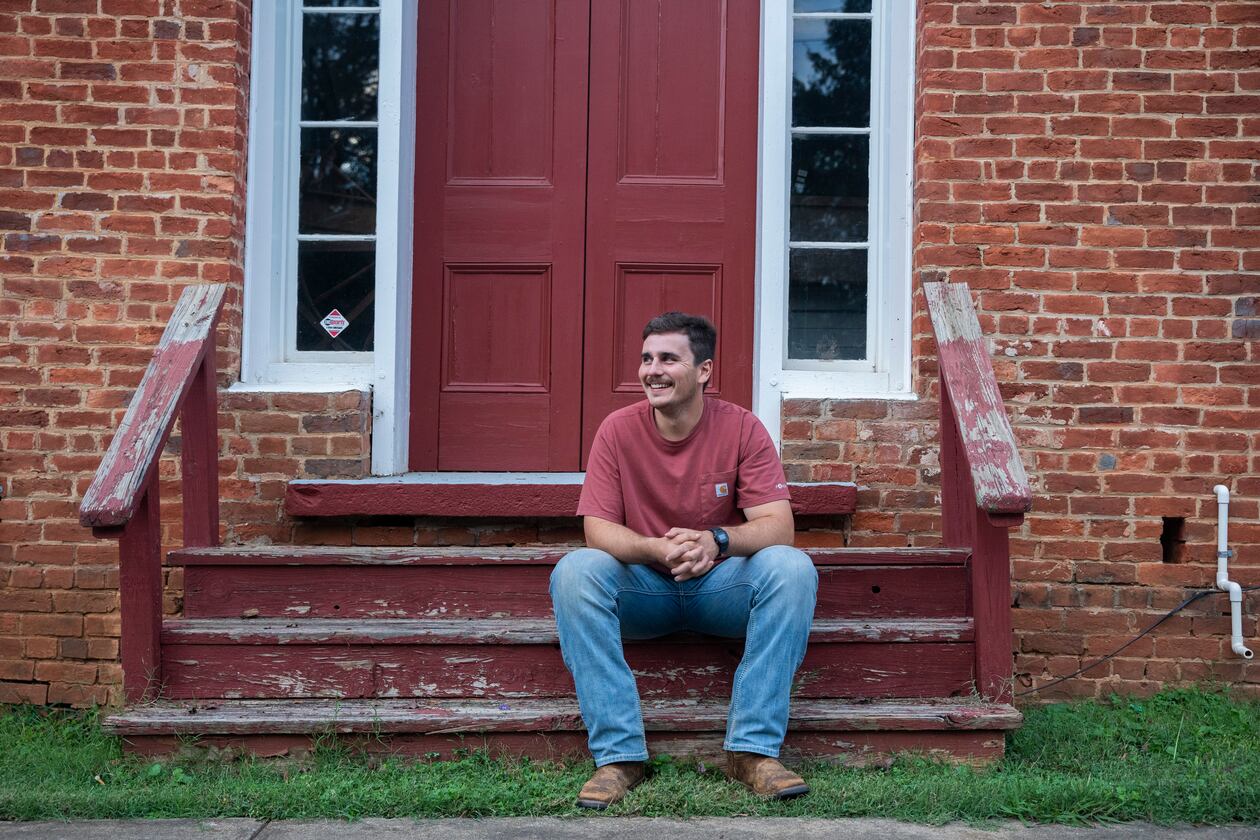 Army veteran Edward Robertson poses for a portrait in downtown Homer, at the Old Courthouse on Oct. 1, 2024. (Olivia Bowdoin for the AJC).