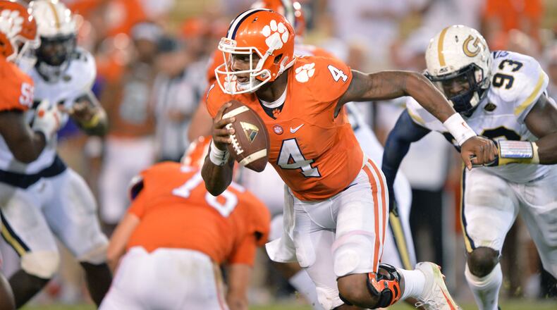 September 22, 2016 Atlanta - Clemson Tigers quarterback Deshaun Watson (4) carries a football in the second half at Bobby Dodd Stadium on Thursday, September 22, 2016. Clemson Tigers won 26 - 7 over the Georgia Tech Yellow Jackets. HYOSUB SHIN / HSHIN@AJC.COM