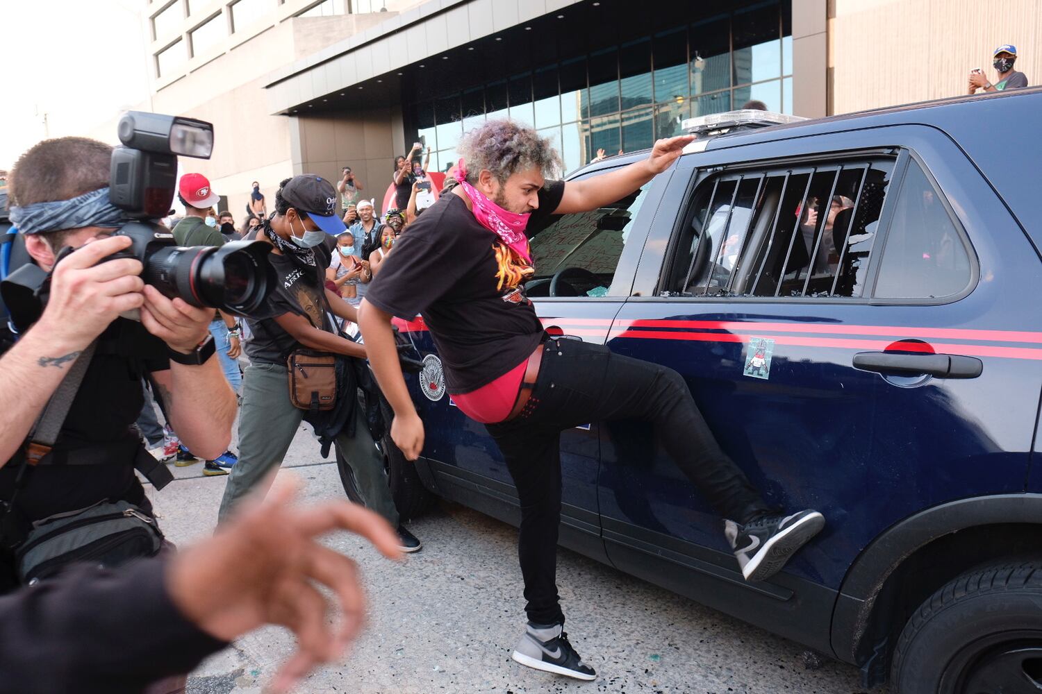Behind the lens --  Protests: Taken FOR THE AJC