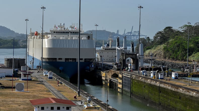 A ship is guided through the Panama Canal's Miraflores locks near Panama City on April 24, 2023. The scarcity of rainfall due to global warming has forced the Panama Canal to reduce the draft of ships passing through the interoceanic waterway, in the midst of a water supply crisis that threatens the future of this maritime route. (Luis Acosta/AFP/Getty Images/TNS)