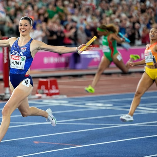 Britain's Amy Hunt crosses the finish line to win the mixed 4 X 100 meters relay final setting a new European record at the European Athletics Championships in Birmingham, England, Sunday, Aug. 16, 2026. (AP Photo/Matthias Schrader)