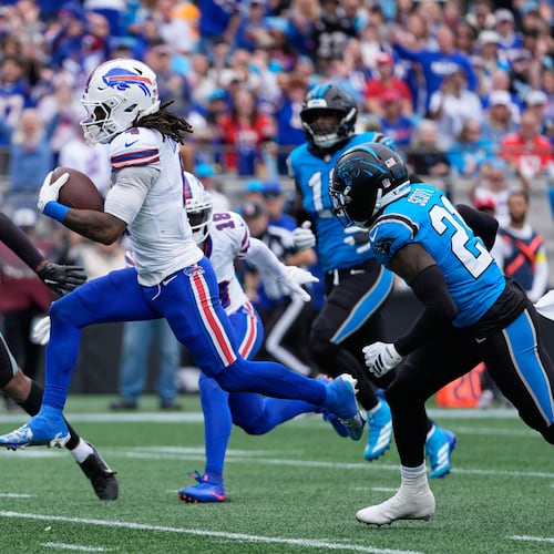 Buffalo Bills running back James Cook III (4) runs for a touchdown against the Carolina Panthers during the second half an NFL football game, Sunday, Oct. 26, 2025, in Charlotte, N.C. (Erik Verduzco/AP)