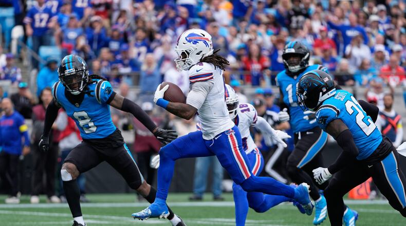 Buffalo Bills running back James Cook III (4) runs for a touchdown against the Carolina Panthers during the second half an NFL football game, Sunday, Oct. 26, 2025, in Charlotte, N.C. (Erik Verduzco/AP)
