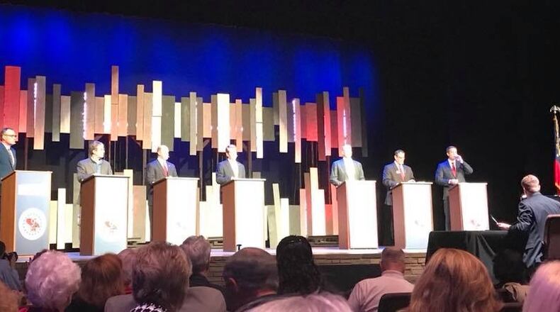 The AJC's Greg Bluestein moderates a debate with all seven GOP candidates for governor.