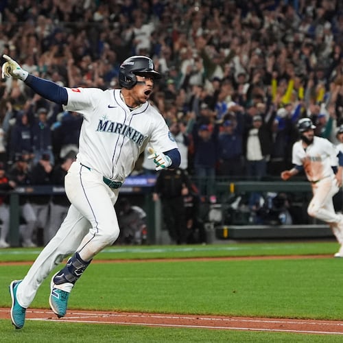FILE - Seattle Mariners' Jorge Polanco reacts after hitting the game-winning RBI-single for J.P. Crawford to score during the 15th inning in Game 5 of baseball's American League Division Series against the Detroit Tigers, Friday, Oct. 10, 2025, in Seattle. (AP Photo/Lindsey Wasson, File)