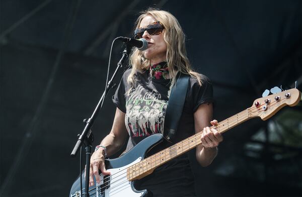 Aimee Mann, singer and bassist for the band The Both, performs at the third annual Shaky Knees Music Festival on Sunday, May 10, 2015, in Atlanta. Mann is the former lead singer of the band 'Til Tuesday. (AP Photo/Ron Harris)