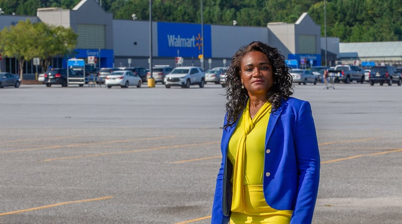 State Rep. Donna McLeod, D-Lawrenceville, stands near the Walmart on Collins Hill Road in Lawrenceville, where a license plate-reading camera has been installed. STEVE SCHAEFER FOR THE ATLANTA JOURNAL-CONSTITUTION