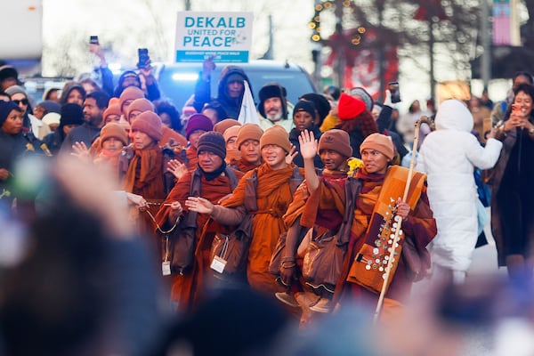 Buddhist monks “Walk for Peace” in Decatur, Ga., on Tuesday, December 30, 2025. The monks started their walk in Texas and are on the way to Washington, D.C. (Abbey Cutrer/AJC)