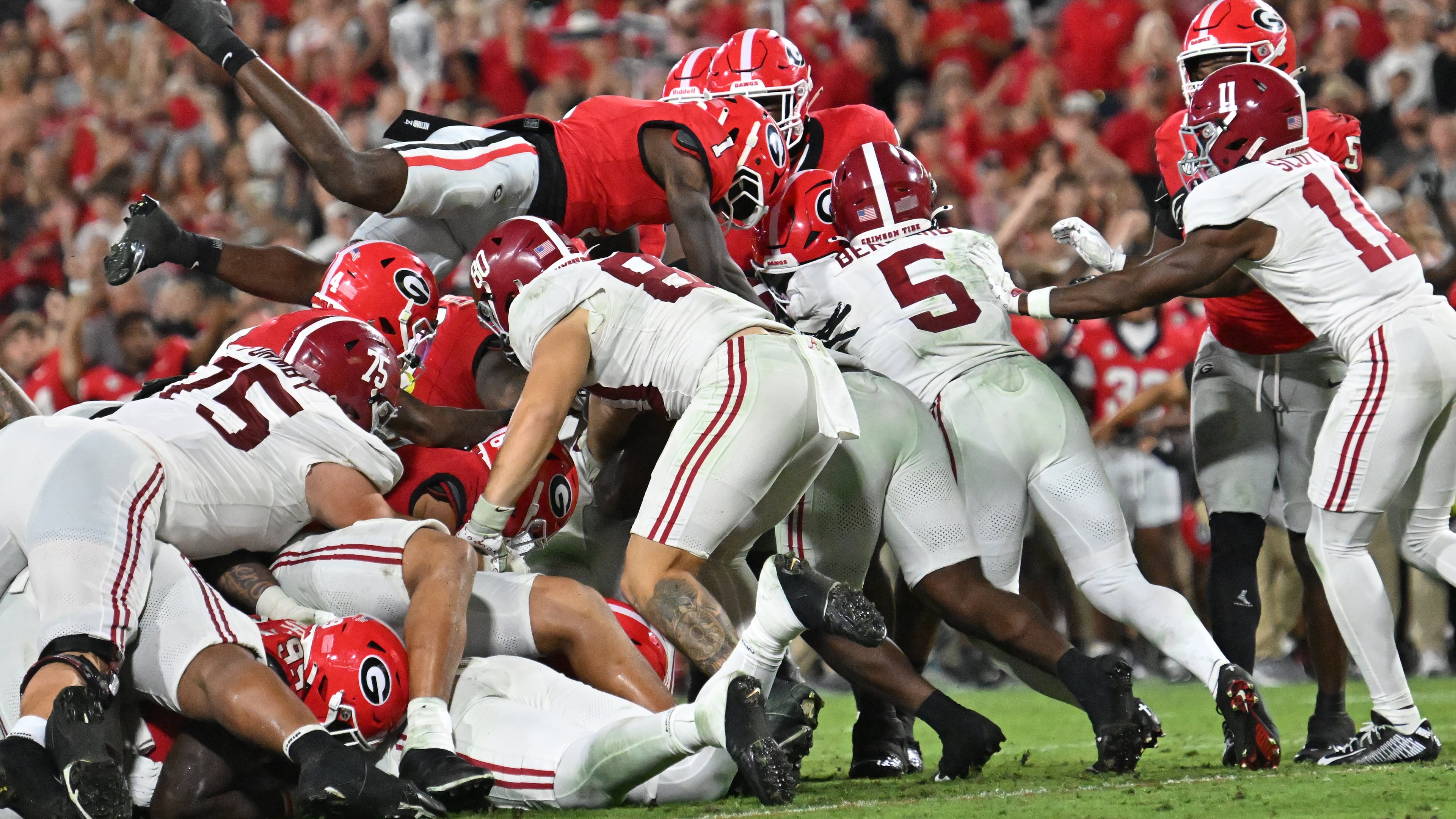 Georgia defensive back Ellis Robinson IV (1) jumps over during the second half in an NCAA football game at Sanford Stadium, Saturday, September 27, 2025, in Athens. Alabama won 24-21 over Georgia. (Hyosub Shin / AJC)