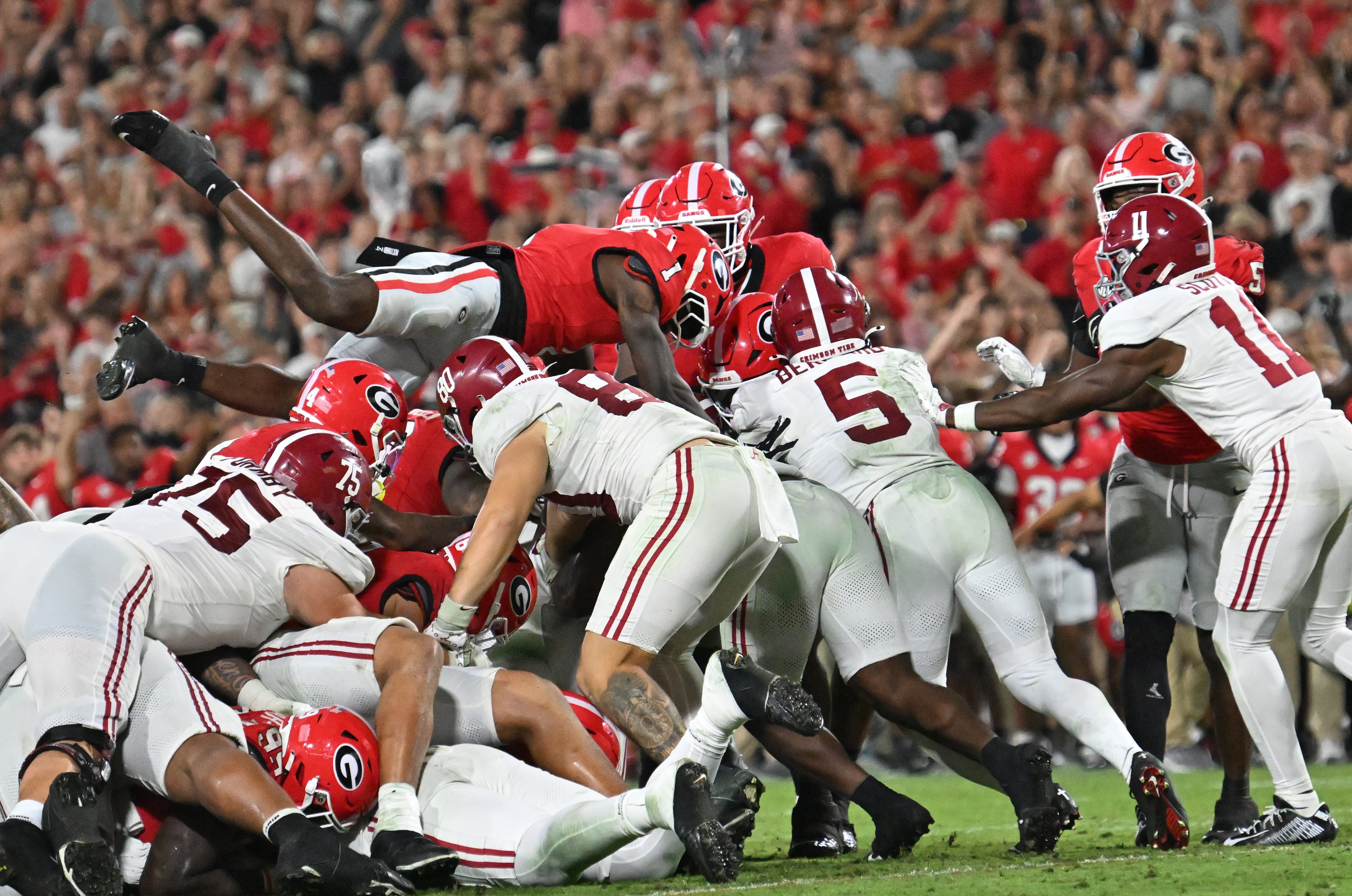 Georgia defensive back Ellis Robinson IV (1) jumps over during the second half in an NCAA football game at Sanford Stadium, Saturday, September 27, 2025, in Athens. Alabama won 24-21 over Georgia. (Hyosub Shin / AJC)
