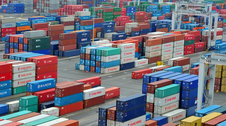 Containers are piled high at the Port of Savannah. More than $17 billion in goods comes into Georgia each year and across-the-board tariffs could raise prices of those shipments. (AJC 2012)