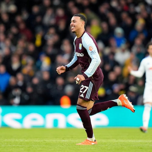 Aston Villa's Morgan Rogers celebrates scoring their side's first goal of the game during the Premier League match between Leeds and Aston Villa in Leeds, England, Sunday, Nov. 23, 2025. (Danny Lawson/PA via AP)