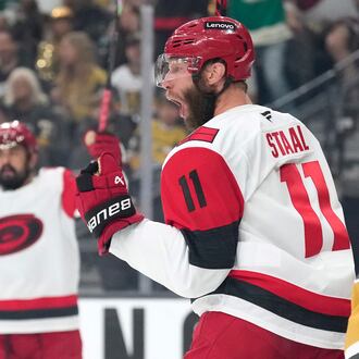 Carolina Hurricanes center Jordan Staal, right, celebrates his goal during the first period in Game 4 of the NHL hockey Stanley Cup Final series against the Vegas Golden Knights, Tuesday, June 9, 2026, in Las Vegas. (AP Photo/John Locher)