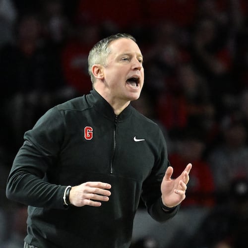 Georgia coach Mike White gives instructions to his players during the first half against Arkansas at Stegeman Coliseum on Saturday, Jan. 17, 2026, in Athens. (Hyosub Shin/AJC)