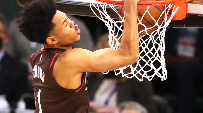 Anfernee Simons of the Portland Trail Blazers slams it home to win the Slam Dunk contest during halftime of the NBA All-Star Game Sunday, March 7, 2021, at State Farm Arena in Atlanta. (Curtis Compton / Curtis.Compton@ajc.com)