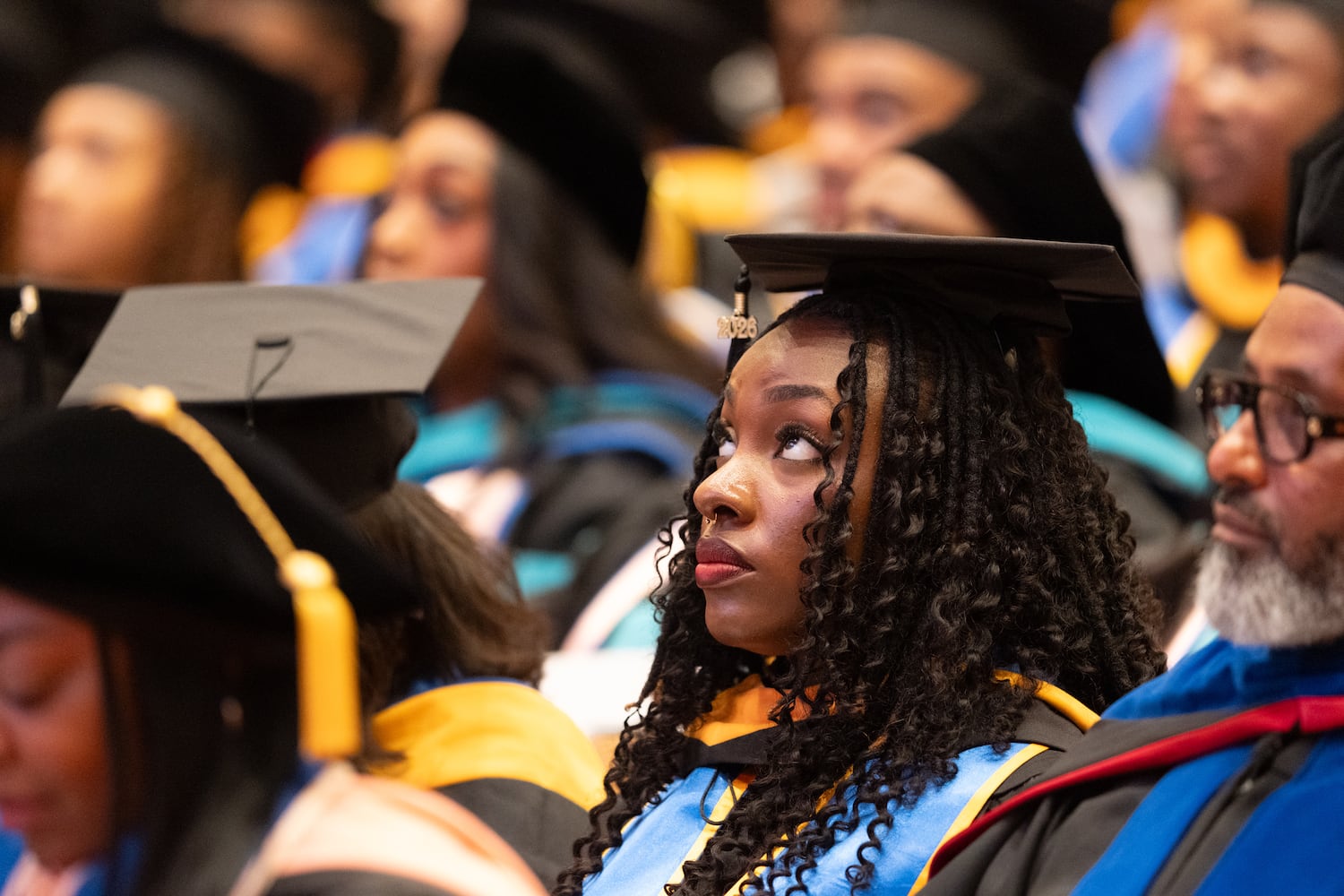A student listens during the graduation ceremony for Morehouse School of Medicine on Saturday, May 16, 2026, in Atlanta. (Ben Gray for the AJC)