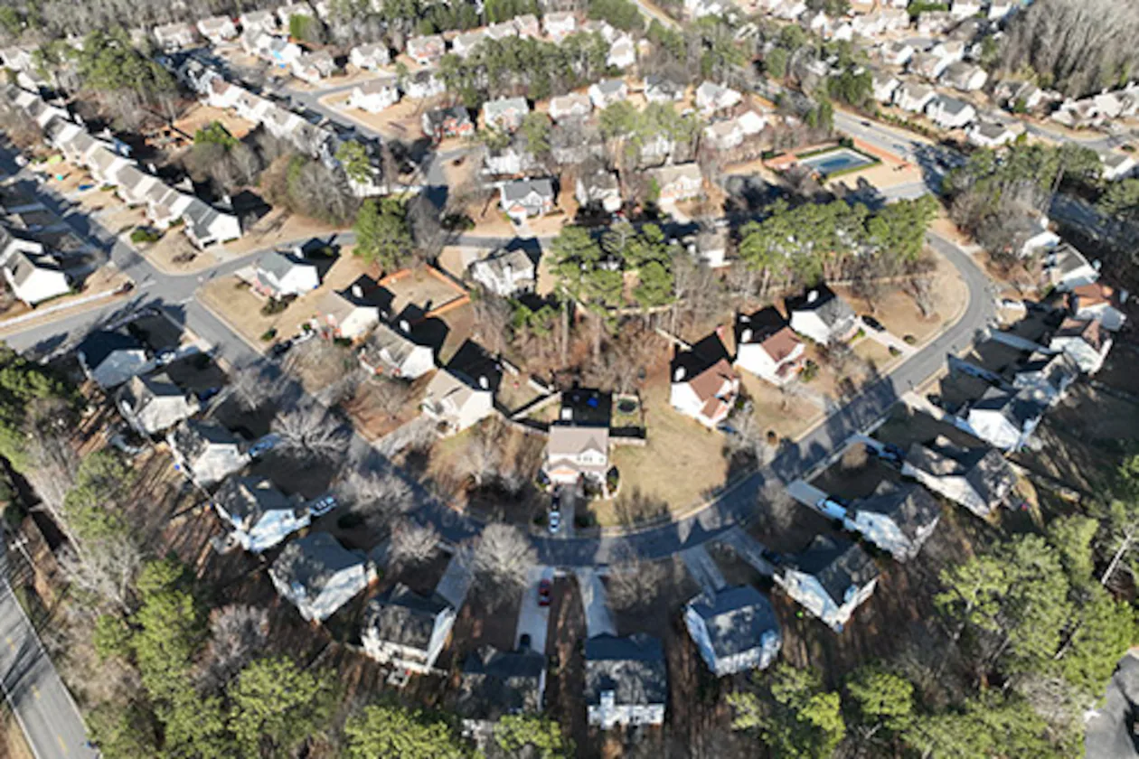 Aerial view of Winslow at Eagles Landing neighborhood, where large number of homes were owned by investors, Thursday, Jan. 26, 2023, in McDonough. Two companies — Invitation Homes and Progress Residential — each owned more than 10,000 homes in the metro Atlanta area as of, or near the end of, the 2nd quarter 2022. (Hyosub Shin/AJC)