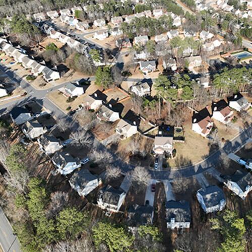 Aerial view of Winslow at Eagles Landing neighborhood, where large number of homes were owned by investors, Thursday, Jan. 26, 2023, in McDonough. Two companies — Invitation Homes and Progress Residential — each owned more than 10,000 homes in the metro Atlanta area as of, or near the end of, the 2nd quarter 2022. (Hyosub Shin/AJC)