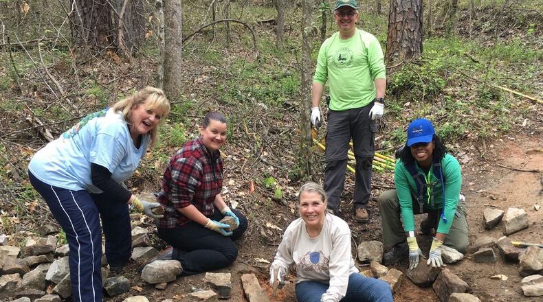 Volunteers with the Chattahoochee National Park Conservancy reinforcing a trail. COURTESY CHATTAHOOCHEE NATIONAL PARK CONSERVANCY