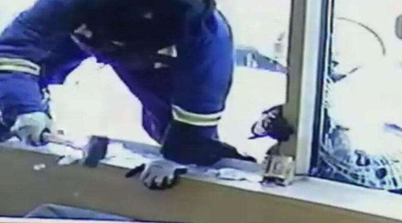 A man used what looked like a hammer to break into a jewelry store, but he was met by employees brandishing swords.