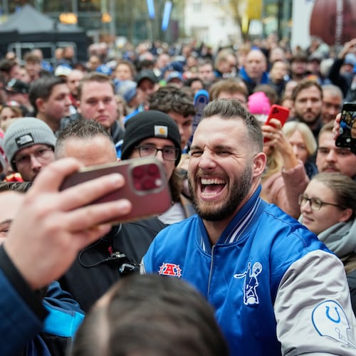 Former Indianapolis Colts player Björn Werner meets fans at Das Center in Potsdamer Platz in Berlin Germany, Saturday, Nov. 8, 2025, ahead of Sunday's NFL football game against the Atlanta Falcons. (AP Photo/Ebrahim Noroozi)