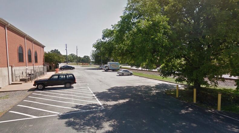 Duluth has approved SPLOST funds to develop a construction plan to reconfigure this parking area in downtown. Courtesy Google Maps
