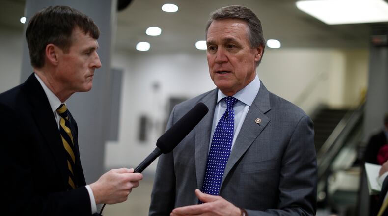 WASHINGTON, DC - FEBRUARY 15: Sen. David Perdue (R-GA) speaks with reporters on Capitol Hill on February 15, 2018 in Washington, DC. The Senate failed to pass an immigration fix, raising questions about the fate of DACA recipients. (Photo by Aaron P. Bernstein/Getty Images)