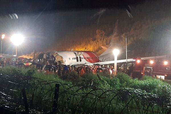 FILE - The Air India Express flight that skidded off a runway while landing at the airport in Kozhikode, Kerala state, India, Friday, Aug. 7, 2020. (AP Photo, File)