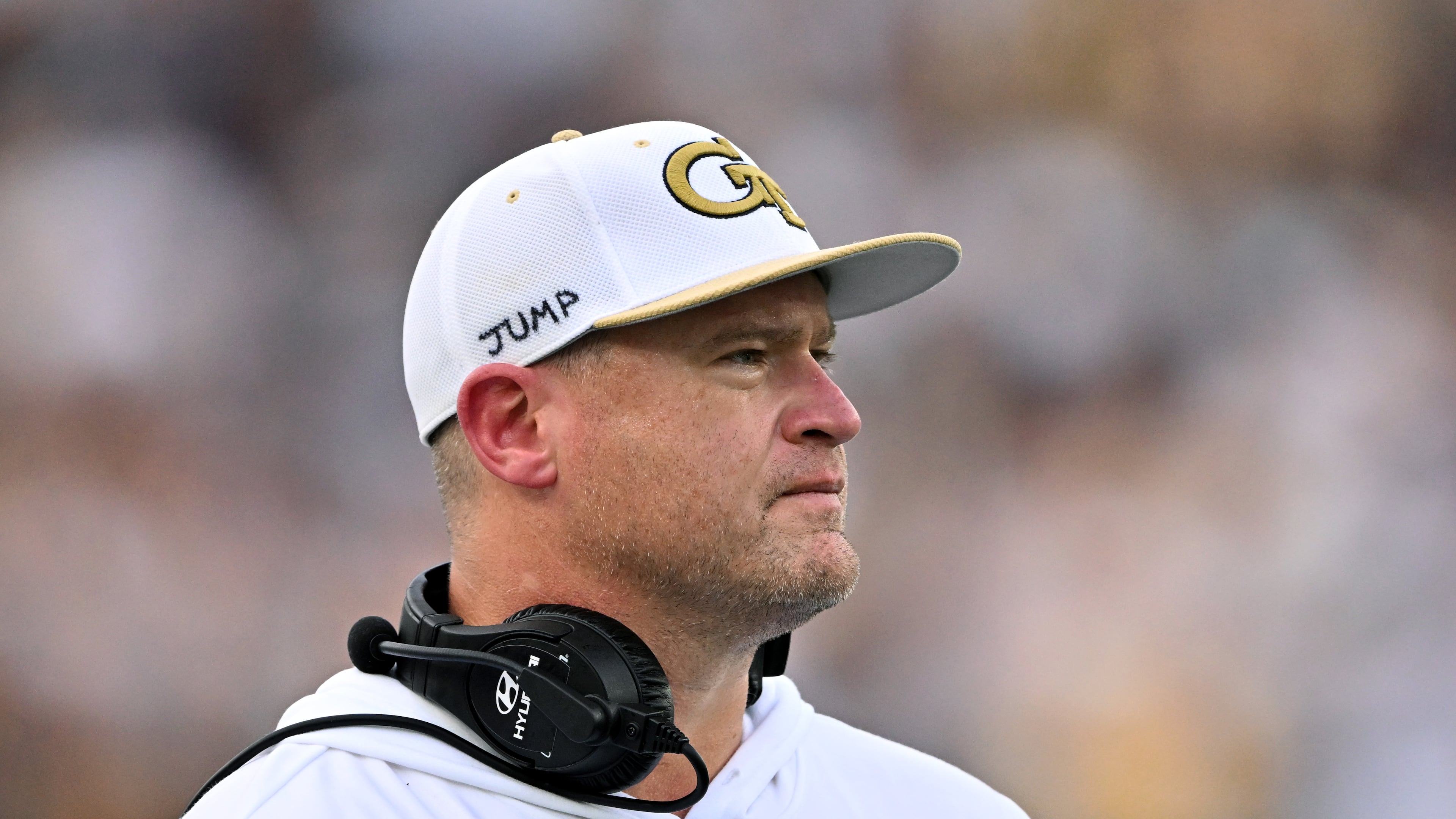 Georgia Tech coach Brent Key, pictured coaching against Gardner-Webb on Saturday, has been on the Yellow Jackets staff for five of Tech's nine straight losses to Clemson. Key was the team's offensive line coach before becoming the head coach. (Hyosub Shin / AJC)