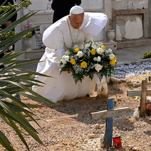 Pope Leo XIV pays tribute at the cemetery and on little Joussef's grave, in Lampedusa, Sicily, southern Italy, Saturday, July 4, 2026, during a one-day pastoral visit to an island that has become a symbol of the risks faced by migrants trying to reach Europe by sea.(Pool Photo/Ciro Fusco, Via AP)