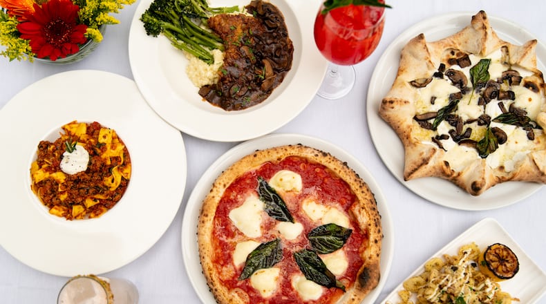 Amalfi Cucina & Mercato is now open in Buckhead, with a menu including (clockwise, from left) Veal Bolognese, Veal Marsala, Tartufo E Funghi Carnevale Pizza, Calamaio, and (center) Amalfi Margherita D.O.P. Pizza. Also shown are cocktails called The Spritz (upper right) and Franco's Fizz (lower left). (Mia Yakel for The Atlanta Journal-Constitution)