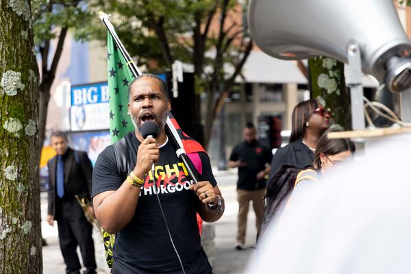 Gerald Griggs, pictured at a protest in June, says he was illegally jailed in 2024 by DeKalb County Superior Court Judge Yolanda Parker-Smith. (Estela Muñoz/AJC)