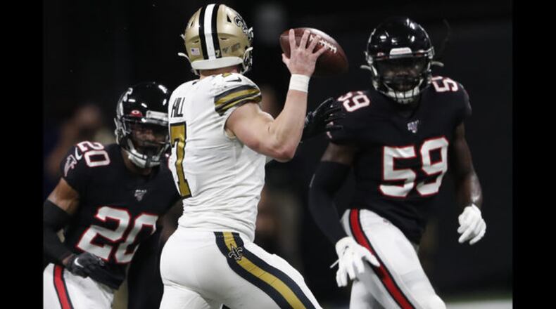 <p> New Orleans Saints quarterback Taysom Hill (7) runs for a touchdown against the Atlanta Falcons during the first half of an NFL football game, Thursday, Nov. 28, 2019, in Atlanta. (AP Photo/John Amis) </p> <p> New Orleans Saints strong safety Vonn Bell (24) hits Atlanta Falcons running back Devonta Freeman (24) during the first half of an NFL football game, Thursday, Nov. 28, 2019, in Atlanta. (AP Photo/Danny Karnik) </p> <p> Atlanta Falcons kicker Younghoe Koo (7) tackles New Orleans Saints wide receiver Deonte Harris (11) during a kickoff during the first half of an NFL football game, Thursday, Nov. 28, 2019, in Atlanta. (AP Photo/John Bazemore) </p> <p> New Orleans Saints wide receiver Tre'Quan Smith (10) makes the catch against Atlanta Falcons strong safety Damontae Kazee (27) during the first half of an NFL football game, Thursday, Nov. 28, 2019, in Atlanta. (AP Photo/John Bazemore) </p> <p> Atlanta Falcons quarterback Matt Ryan (2) slides to the turf after during the first half of an NFL football game against the New Orleans Saints, Thursday, Nov. 28, 2019, in Atlanta. (AP Photo/John Bazemore) </p> <p> New Orleans Saints quarterback Taysom Hill (7) passes against Atlanta Falcons defensive back Kendall Sheffield (20) and Atlanta Falcons outside linebacker De'Vondre Campbell (59) during the second half of an NFL football game, Thursday, Nov. 28, 2019, in Atlanta. (AP Photo/John Bazemore) </p> <p> New Orleans Saints cornerback Eli Apple (25) tackles Atlanta Falcons wide receiver Calvin Ridley (18) during the second half of an NFL football game, Thursday, Nov. 28, 2019, in Atlanta. (AP Photo/John Bazemore) </p> <p> New Orleans Saints wide receiver Deonte Harris (11) runs against Atlanta Falcons defensive back Kemal Ishmael (36) during the second half of an NFL football game, Thursday, Nov. 28, 2019, in Atlanta. (AP Photo/John Bazemore) </p> <p> Former NFL player and Football Hall of Fame member Tony Gonzalez stands with his family as he was celebrated on the field at half time of an NFL football game between the Atlanta Falcons and the New Orleans Saints, Thursday, Nov. 28, 2019, in Atlanta. (AP Photo/John Bazemore) </p> <p> New Orleans Saints quarterback Taysom Hill (7) celebrates a touchdown against the Atlanta Falcons during the first half of an NFL football game, Thursday, Nov. 28, 2019, in Atlanta. (AP Photo/John Amis) </p> <p> New Orleans Saints quarterback Taysom Hill (7) blocks a punt by Atlanta Falcons punter Ryan Allen (9) during the first half of an NFL football game, Thursday, Nov. 28, 2019, in Atlanta. (AP Photo/John Amis) </p>