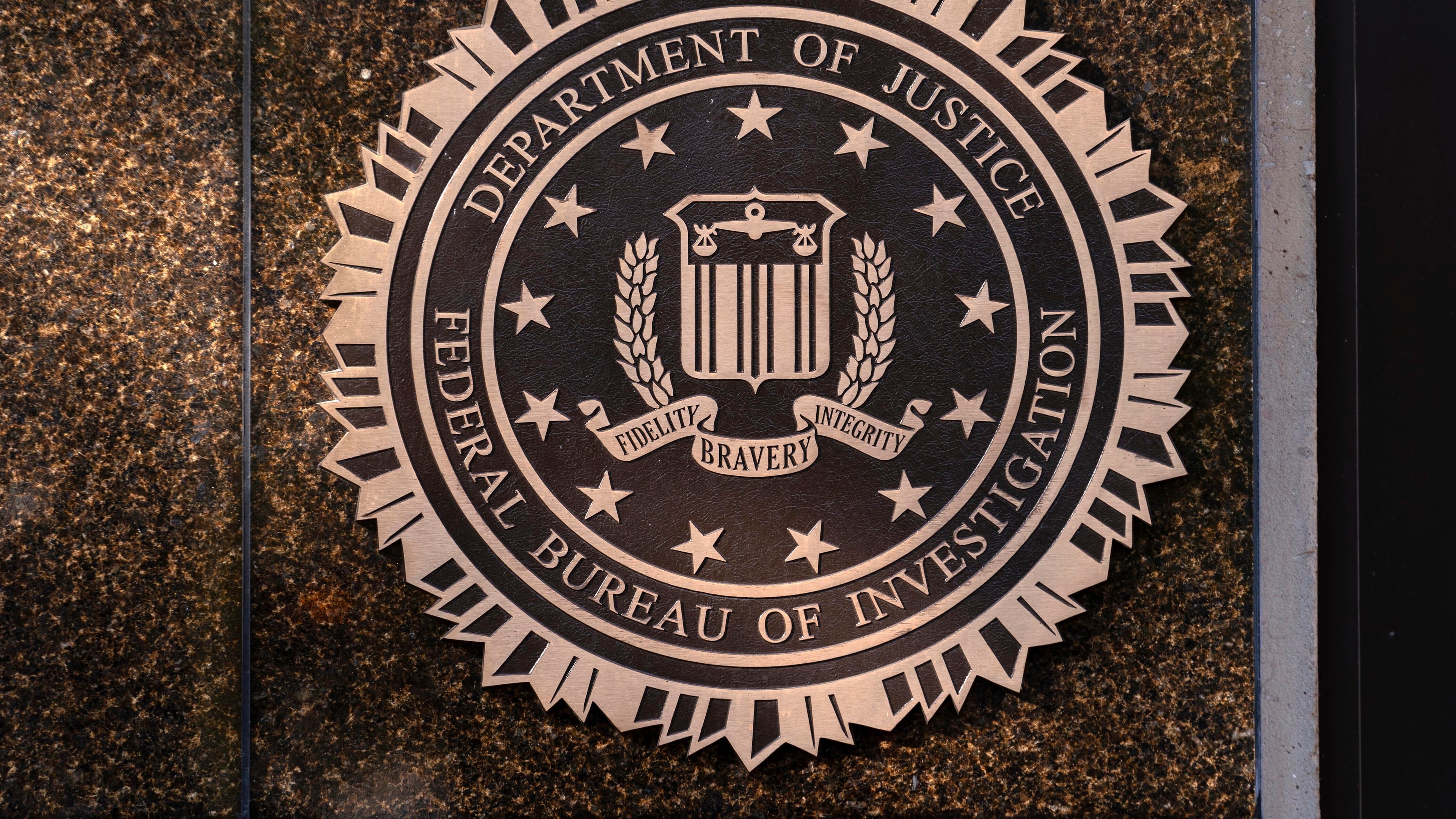 FILE - The seal of the Federal Bureau of Investigation is displayed at its headquarters in Washington, Nov. 18, 2024. (AP Photo/Jose Luis Magana, File)