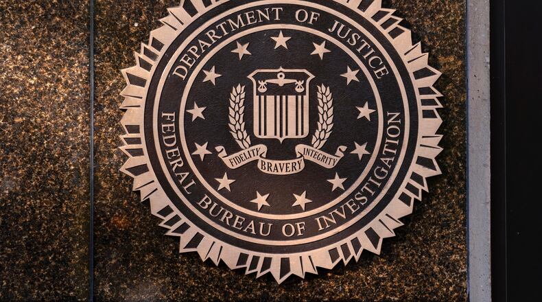FILE - The seal of the Federal Bureau of Investigation is displayed at its headquarters in Washington, Nov. 18, 2024. (AP Photo/Jose Luis Magana, File)