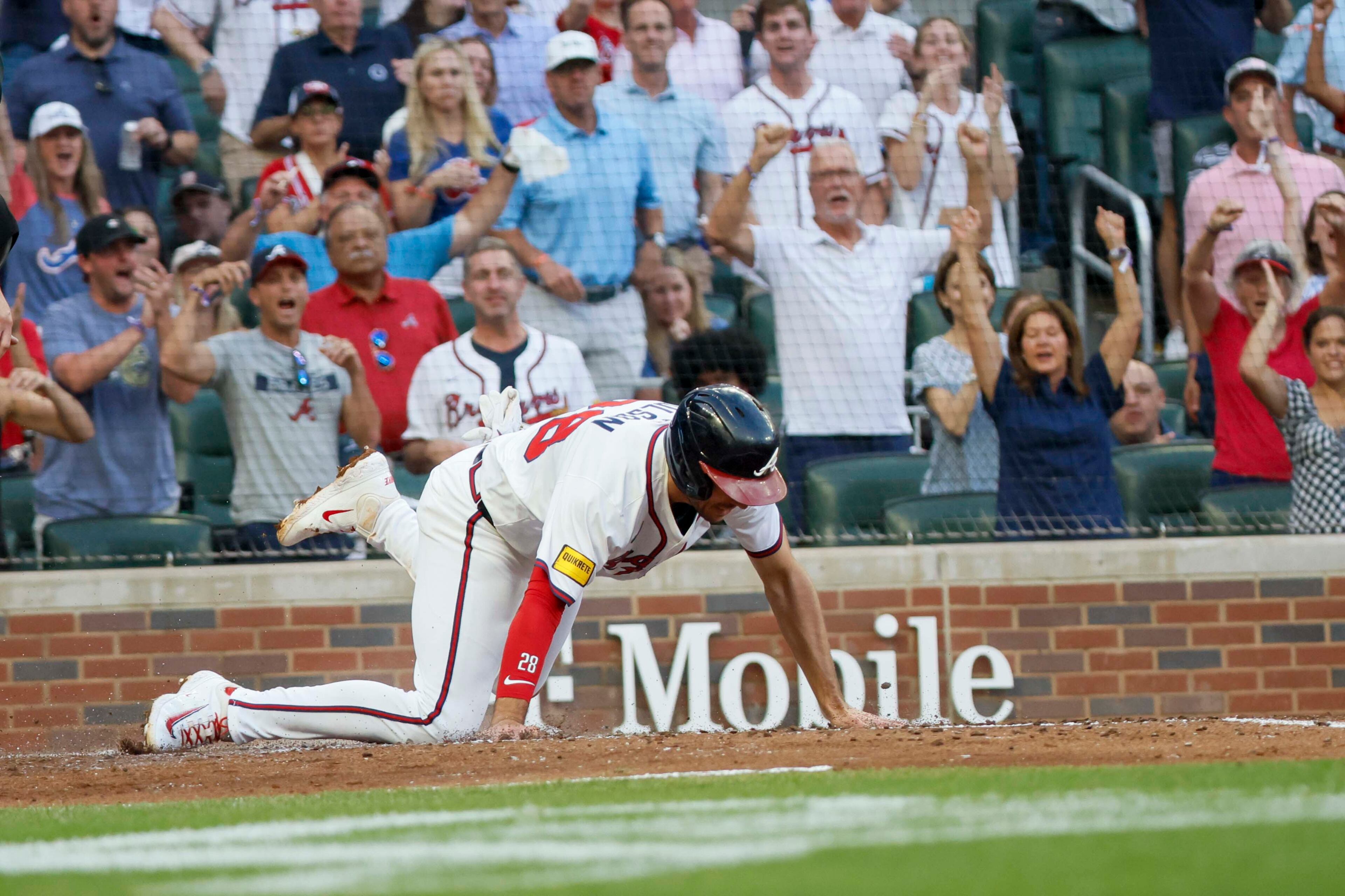 Atlanta Braves first baseman Matt Olson (28) gets safe at home plate as he scores his team’s second run during the fourth inning against the Arizona Diamondbacks at Truist Park on Tuesday, June 3, 2025, in Atlanta.
(Miguel Martinez/ AJC)