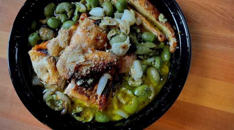 Pollo Amalfi, bedecked with roasted cipollini onions and whole olives, is a delicious choice from Gio's Chicken Amalfitano. Henri Hollis/henri.hollis@ajc.com