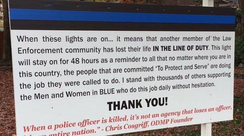 Snellville City Councilman Bobby Howard put a four-by-eight-foot sign in his yard following the death of five police officers in Dallas, Texas.