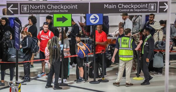 October 9, 2023 Hartsfield-Jackson International Airport: With travelers stuck waiting in severely long lines at Hartsfield-Jackson International during busy periods over the holiday weekend, airport officials warned travelers departing Monday, Oct. 9, 2023 (shown here) to get to the airport three hours before their flights. (John Spink / John.Spink@ajc.com) 

