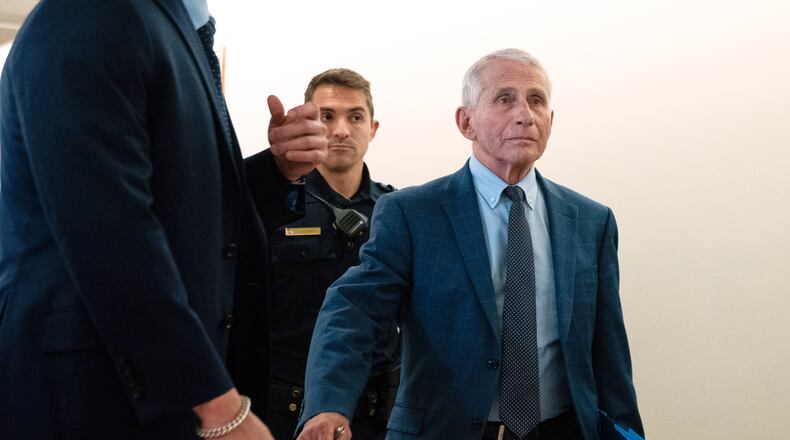 Dr. Anthony Fauci departs after appearing before the Senate Homeland Security and Governmental Affairs Committee hearing at the Capitol, Wednesday, July 29, 2026, in Washington. (AP Photo/Allison Robbert)