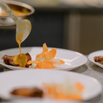 Chef Demetrius Brown will open his Heritage Supper Club as a brick-and-mortar in Summerhill next year. The supper club offers this lemon pepper wings and crudite, plus other dishes. (Courtesy of James Ly)