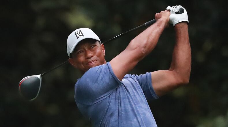 Tiger Woods watches his drive from the 11th tee during a practice round Monday, April 8, 2019, for the Masters Tournament at Augusta National Golf Club in Augusta.