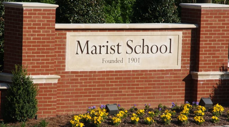 A sign at the entrance of Marist School in Brookhaven.