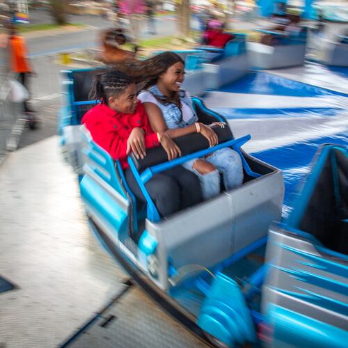 People enjoy the rides at the Atlanta Fair on Sunday, March 6, 2022. This was the opening weekend for the annual fair that runs through April 10. (Photo by Steve Schaefer for The Atlanta Journal-Constitution)