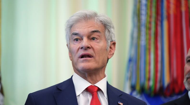 Centers for Medicare & Medicaid Services administrator Dr. Mehmet Oz speaks speaks during an event on health care affordability in the Oval Office at the White House, Thursday, April 23, 2026, in Washington. (AP Photo/Mark Schiefelbein)