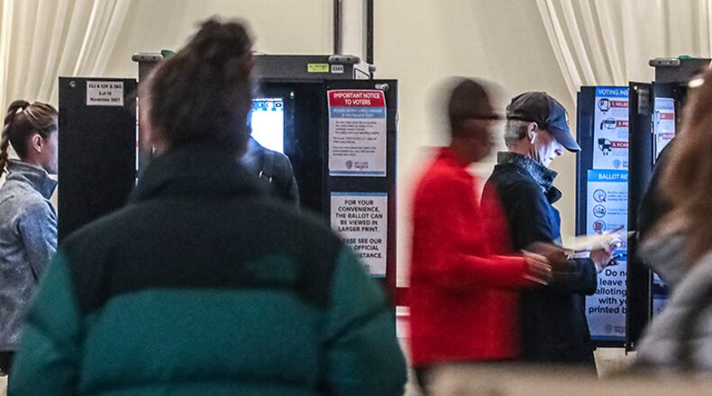 The runoff election that will set the course for the next four years at Atlanta City Hall will be decided Tuesday, as voters head to the polls and elect the city’s 61st mayor. (John Spink / John.Spink@ajc.com)