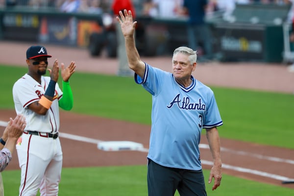Former Braves star Dale Murphy (right) acknowledges fans during an on-field ceremony honoring the 60th anniversary of Braves baseball in Atlanta on Friday, March 27, 2026. (Jason Getz/AJC)